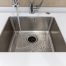 Stainless kitchen sink with food waste disposal