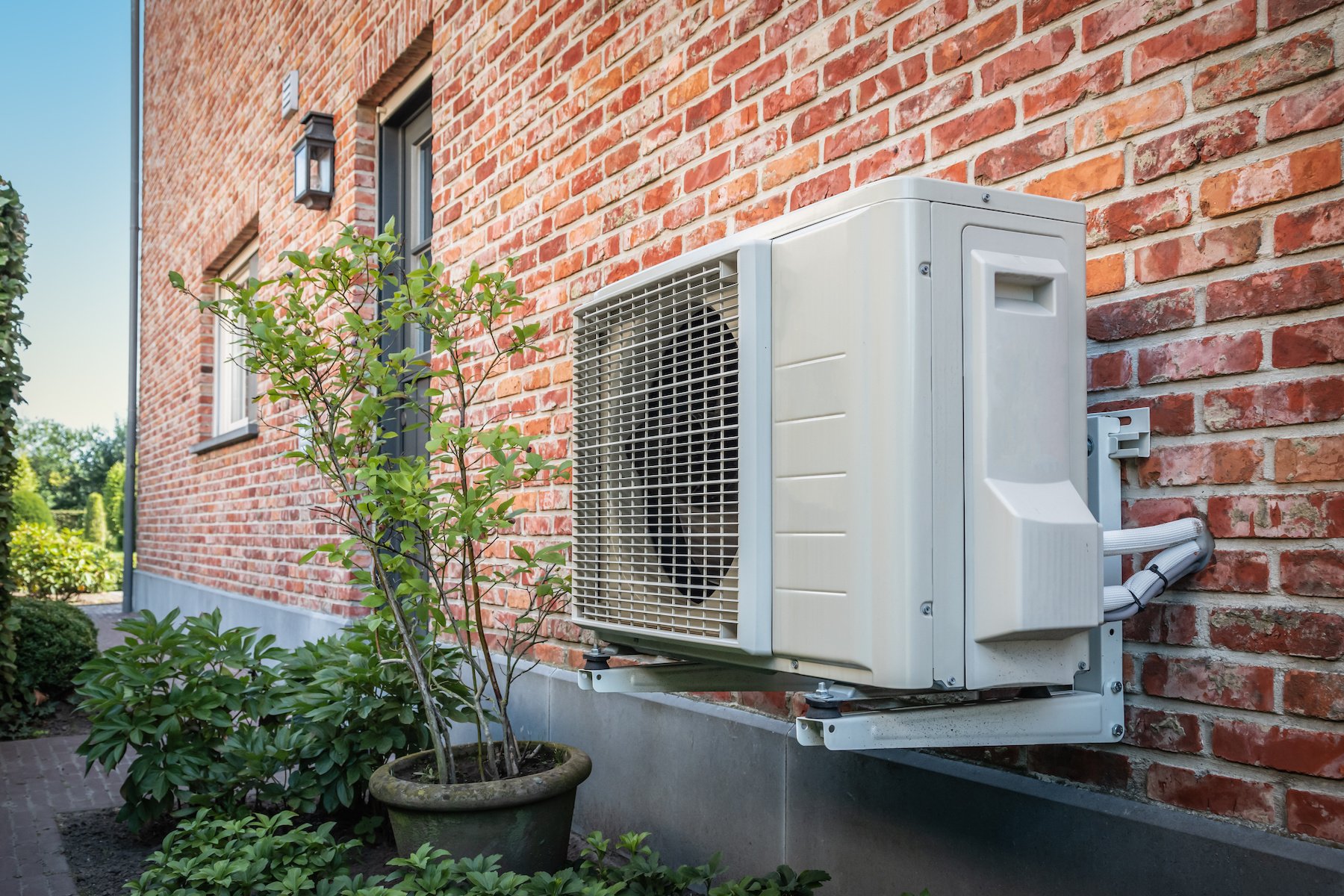 Air to air heat pump for cooling or heating the home. Outdoor unit powered by renewable energy.