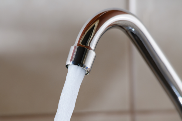 Opened kitchen faucet.